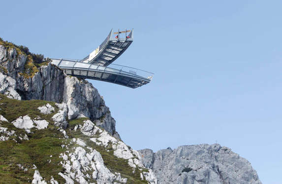Employees work on the AlpspiX viewing platform at the southern Bavarian Alps mountain Alpspitze in Garmisch-Partenkirchen June 29, 2010. Each arm of the so-called AlpspiX platform is 25 metres (82 feet) long and will end with a glass wall providing panoramas of Hoellental and Garmisch with a spectacular view down 1000 metres below. It is due to open on July 4.