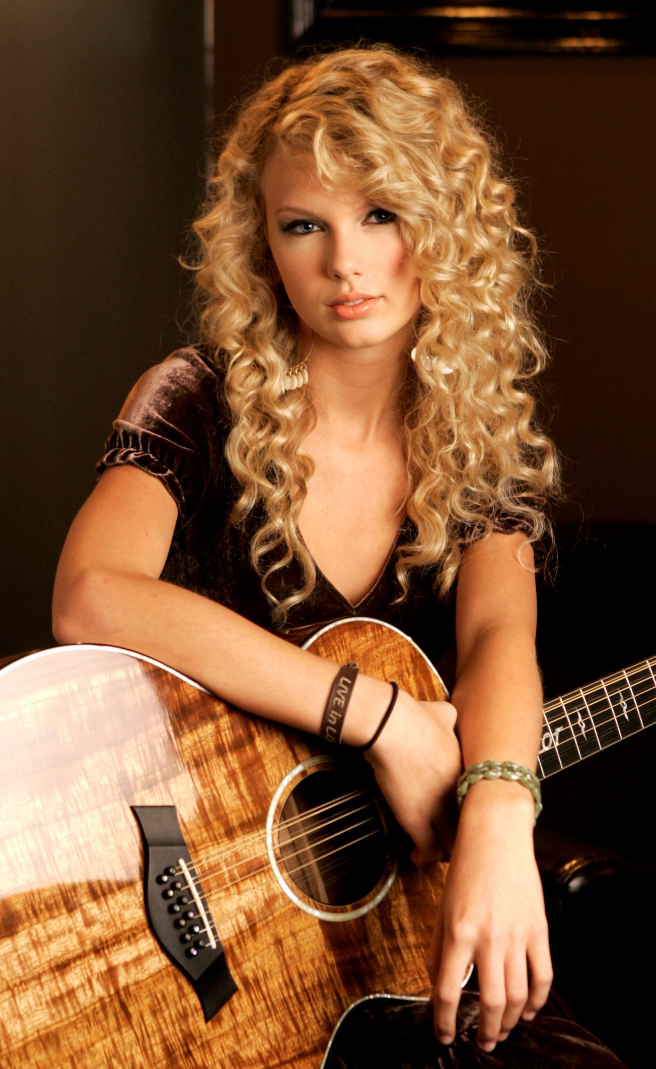 Tim McGraw, Taylor Swift's first single from her then untitled album, was released four months ahead of her debut full-length on Big Machine Records. The song was Swift's first appearance on the Billboard Hot 100 and Country Songs chart, reaching as high as number six on the list.