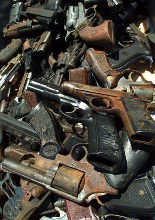 Confiscated firearms await destruction in the coastal city of Durban. For many, the main worry is South Africa's shockingly high crime levels.