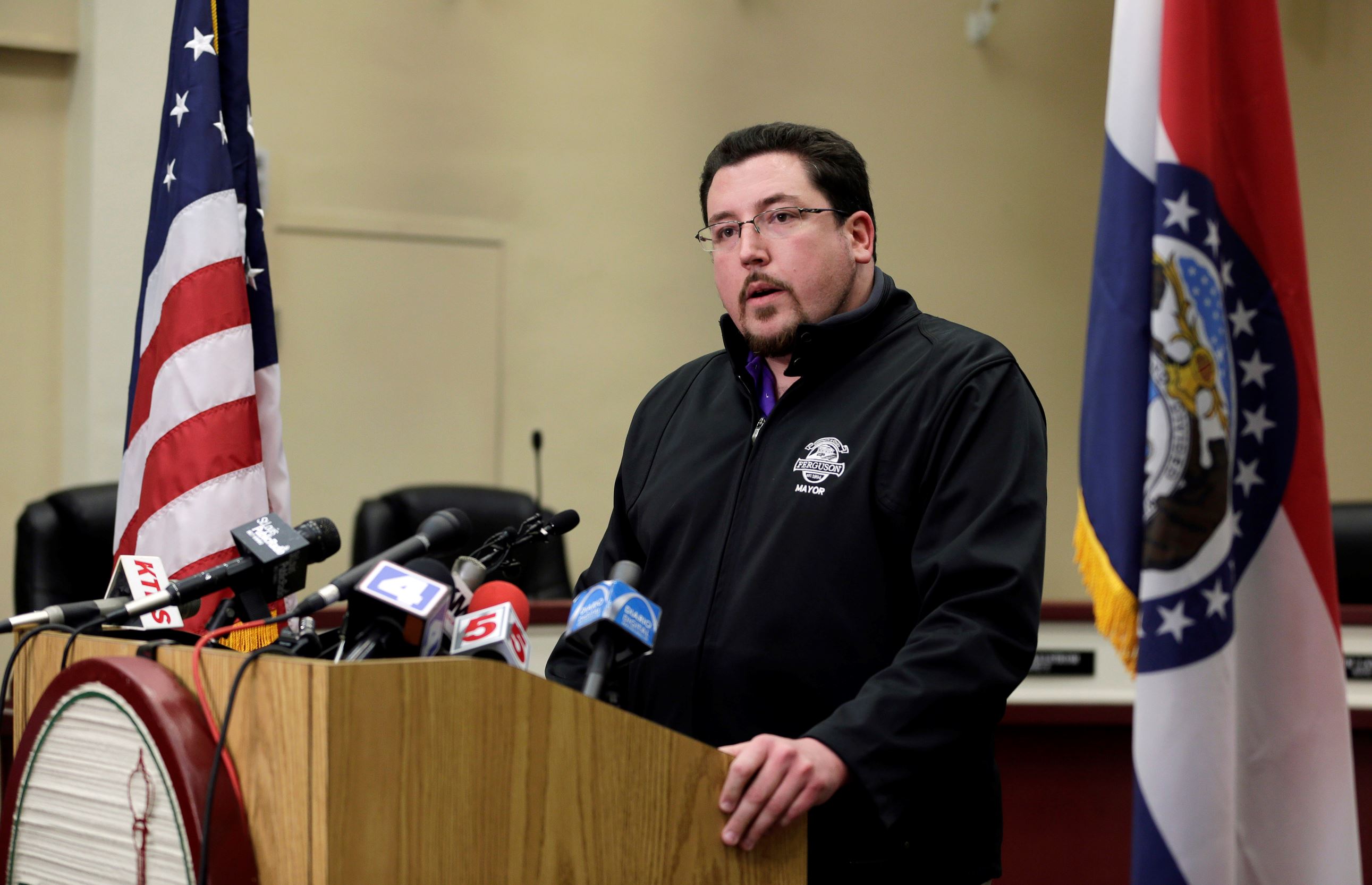 Ferguson Mayor James Knowles III announces the resignation of police chief Thomas Jackson during a news conference Wednesday, March 11, 2015, in Ferguson, Mo. The resignation comes in the wake of a scathing Justice Department report prompted by the fatal shooting of an unarmed black 18-year-old by a white police officer.