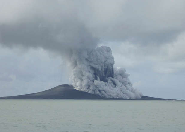 CORRECTS SOURCE - In this photo, taken Jan. 14, 2015 and released by New Zealand's Ministry of Foreign Affairs and Trade, a volcano erupts near Tonga in the South Pacific Ocean. A volcano that has been erupting for several weeks near Tonga has created a new island in the ocean. (AP Photo/New Zealand's Ministry of Foreign Affairs and Trade)