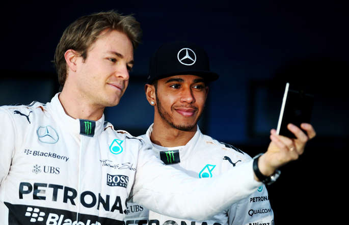 Lewis Hamilton of Great Britain and Mercedes GP and Nico Rosberg of Germany and Mercedes GP pose with the new W06 at its launch outside the team garage during day one of Formula One Winter Testing at Circuito de Jerez on February 1, 2015 in Jerez de la Frontera, Spain.