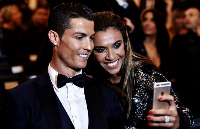 Rosengard's Brazilian forward Marta (R) takes a selfie with Real Madrid and Portugal forward Cristiano during the 2014 FIFA Ballon d'Or award ceremony at the Kongresshaus in Zurich on January 12, 2015.