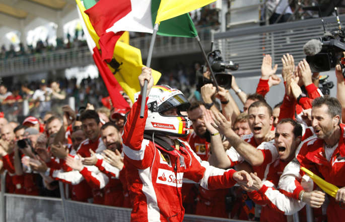 Sebastian Vettel of Ferrari celebrates his victory in Malaysia