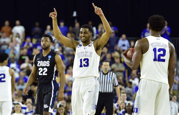 Duke Blue Devils guard Matt Jones celebrates as time expires during the second half in the finals of the south regional of the 2015 NCAA Tournament against the Gonzaga Bulldogs March 29 in Houston.