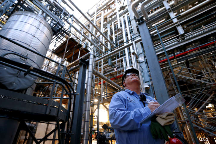 Maleic anhydride production technician Dale Martin checks on the maleic anhydride unit at Huntsman's polyurethane plant in Geismar, Louisiana May 5, 2014. Picture taken May 5, 2014. To match Special Report USA-GERMANY/POWER REUTERS/Jonathan Bachman (UNITED STATES - Tags: ENERGY BUSINESS INDUSTRIAL POLITICS)