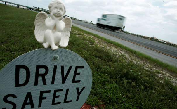 A freshly decorated official Florida roadside memorial has an angel on top of it Thursday, May 24, 2007 near Miramar, Fla., as traffic officials urge motorists to drive carefully over the Memorial Day weekend holiday. J. Pat Carter/AP