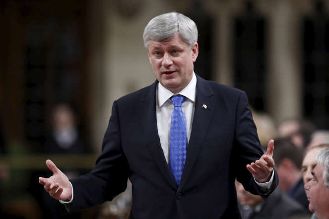 Canada's Prime Minister Stephen Harper speaks during Question Period in the House of Commons on Parliament Hill in Ottawa April 1, 2015.