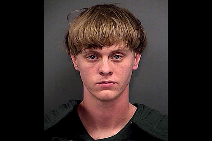 Dylann Roof is seen in this June 18, 2015 handout booking photo provided by Charleston County Sheriff&#39;s Office. Roof, a 21-year-old white man, was arrested on Thursday on suspicion of having fatally shot nine people at a historic African-American church in South Carolina. The U.S. Department of Justice is investigating Wednesday&#39;s attack as a hate crime, motivated by racism or other prejudice.