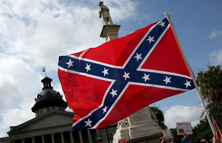 Demonstrators protest at the South Carolina State House calling for the Confederate flag to remain on the State House grounds June 27, 2015 in Columbia, S.C.