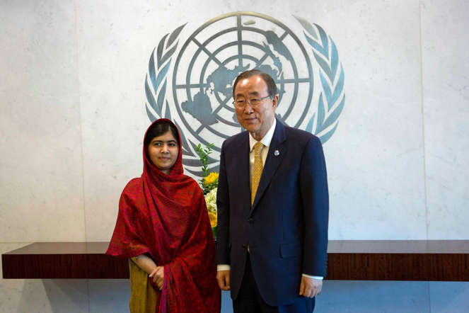 Pakistani schoolgirl activist Malala Yousafzai poses for pictures with United Nations Secretary General Ban Ki-moon during a photo opportunity at the United Nations in the Manhattan borough of New York August 18, 2014.