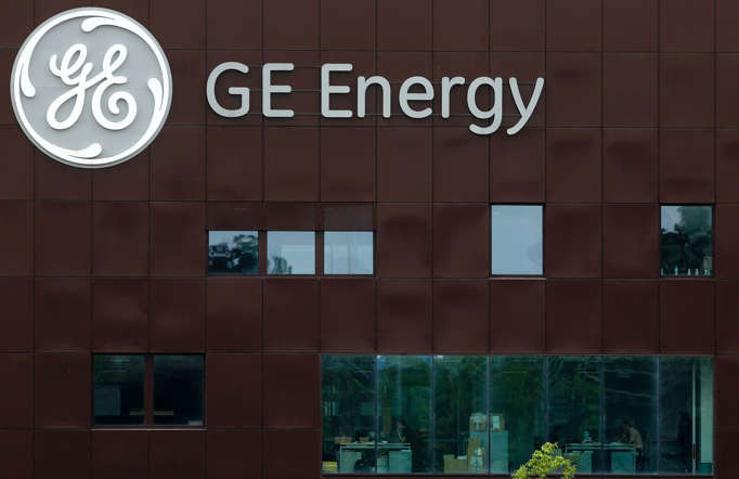 The logo of U.S. conglomerate General Electric is pictured at the company's site in Belfort, June 23, 2014. France will be making a sound investment by taking a stake in the French power and transport engineering company Alstom, its chief executive said on Monday, adding however that the government would be buying in too late to have a say in the use of proceeds from its tie-up with General Electric.