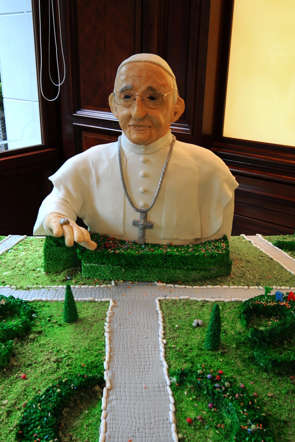A chocolate cake depicting Pope Francis made to mark his one day visit in the Italian city of Caserta.
