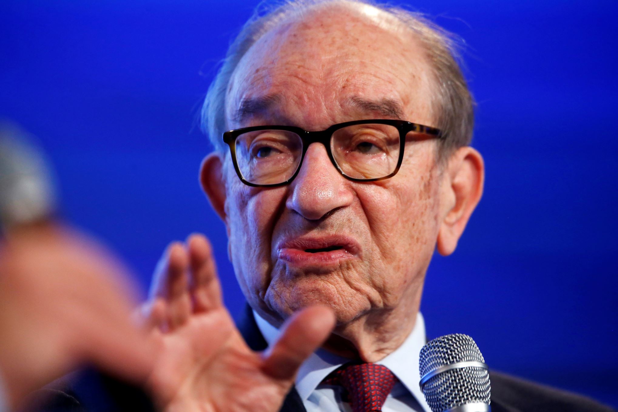 Former Federal Reserve Chairman Alan Greenspan answers a question by Ben White of Politico at the 2014 Fiscal  Summit organized by the Peter G. Peterson Foundation in Washington, on May 14, 2014.