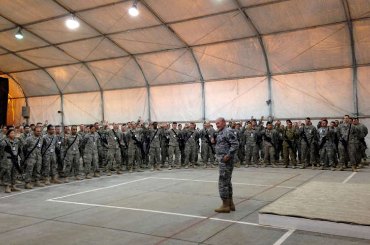 U.S. Army General Martin Dempsey, chairman of the Joint Chiefs of Staff, speaks with soldiers in Iraq November 15, 2014.