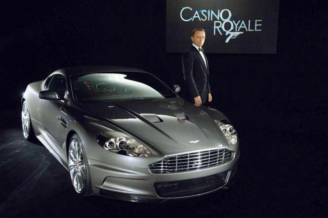 A photo made available Thursday May 4, 2006 by luxury car company Aston Martin of the new Bond, Daniel Craig with the new DBS model that James Bond will drive in the next 007 film Casino Royale. The new Bond will follow in the footsteps of other 007s by having an Aston Martin. (AP Photo/Aston Martin) ** NO SALES **