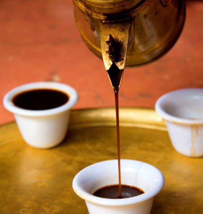 The Arabian brew is spiced with cardamom and people have it with dates to counter the bitter taste of coffee.