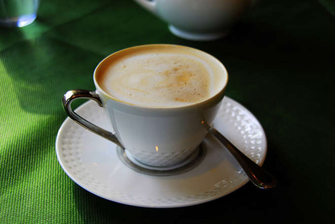 A usual day begins in France with a cup of café au lait. This is a hot milk coffee that is normally served in a mug - wide enough for people to dunk their baguettes (French bread) or croissants.