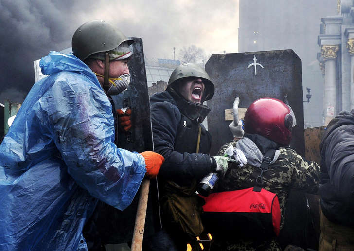 Protesters battle in the streets of Kiev, Ukraine, in February, 2014.