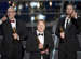 Roy Conli, from left, Don Hall, and Chris Williams  accept the award for best animated feature film for “Big Hero 6” at the Oscars on Sunday, Feb. 22, 2015, at the Dolby Theatre in Los Angeles. (Photo by John Shearer/Invision/AP)