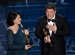 Anna Pinnock, left, and Adam Stockhausen accept the award for best production design for “The Grand Budapest Hotel” at the Oscars on Sunday, Feb. 22, 2015, at the Dolby Theatre in Los Angeles. (Photo by John Shearer/Invision/AP)