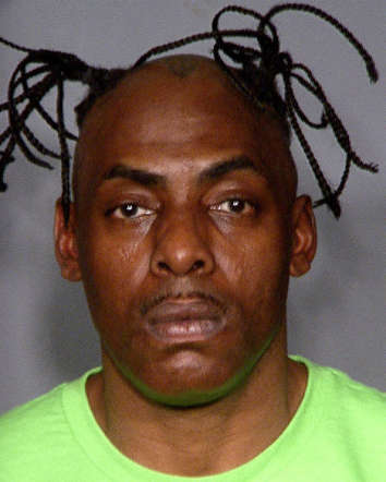 In this handout images provided by the Las Vegas Metropolitan Police Department, rapper Coolio, real name Artis Leon Ivey Jr., is seen in a booking photo March 9, 2012 in Las Vegas, Nevada.