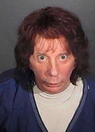 In this police booking photo released by the Los Angeles County Sheriff's Dept., rock music producer Phil Spector poses for a mugshot April 13, 2009 in Los Angeles, California. Spector was found guilty of second degree murder during the re-trial in the shooting death of actress Lana Clarkson in 2003.
