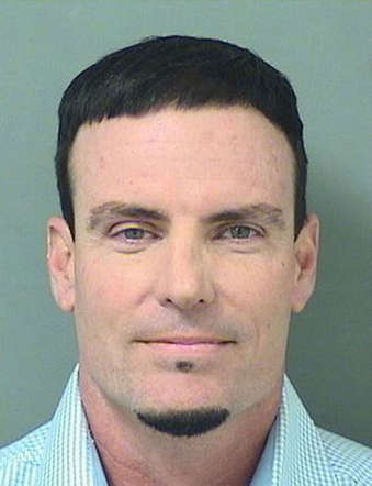 In this handout provided by the Palm Beach County Jail, Rapper Vanilla Ice, also known as Robert Van Winkle poses for his mugshot after being arrested on burglary charges on February 18, 2015 in Lantana, Florida. Police arrested him for taking various items from a residential home in Florida.
