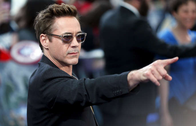 Cast member Downey Jr. poses at the European premiere of "Avengers: Age of Ultron" at Westfield shopping centre, Shepherds Bush, London