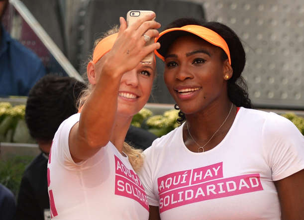 Tennis players Serena Williams, right, and Caroline Wozniacki take a selfie during a charity event held on the ocassion of the Mutua Madrid Open tennis tournament in Madrid, Spain, on May 1.