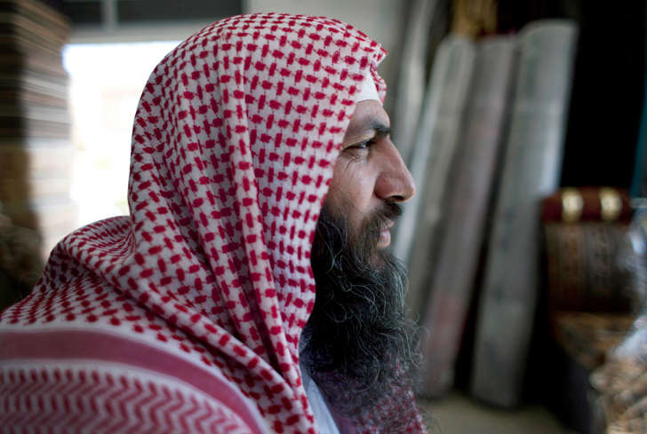 Salafi cleric Mohammed al-Shalabi, 48, widely known as Abu Sayyaf, talks during an interview on Oct. 29, 2014.