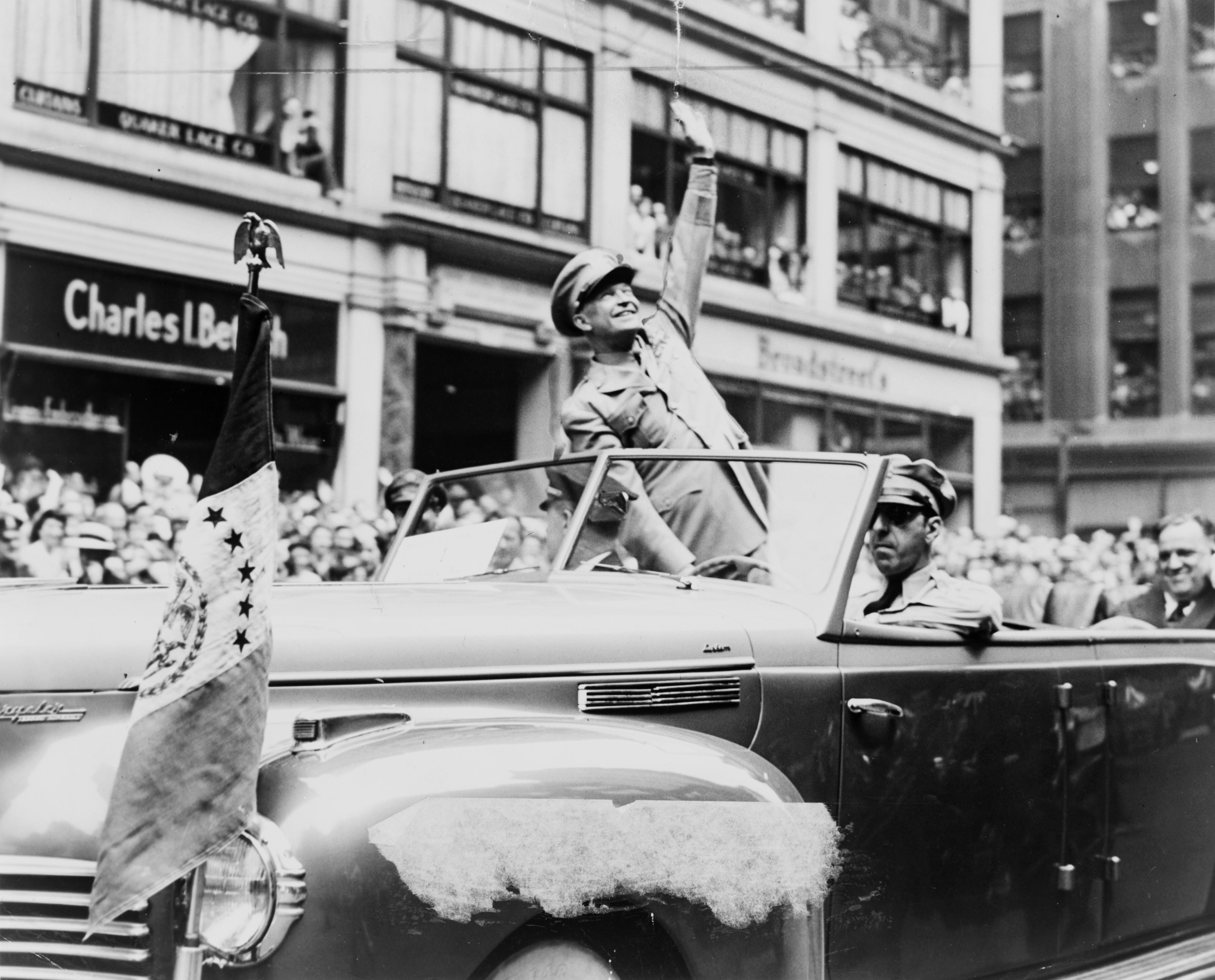 U.S. General Dwight D. Eisenhower waves to the crowd at a parade in the United States in 1945, in this handout photo provided by the United States Library of Congress. Seventy years ago, following the suicide of Nazi leader Adolf Hitler, Germany's head of state Karl Donitz signed his country's surrender to Allied forces in Reims, France on May 7, 1945 and in Berlin on May 8, 1945.