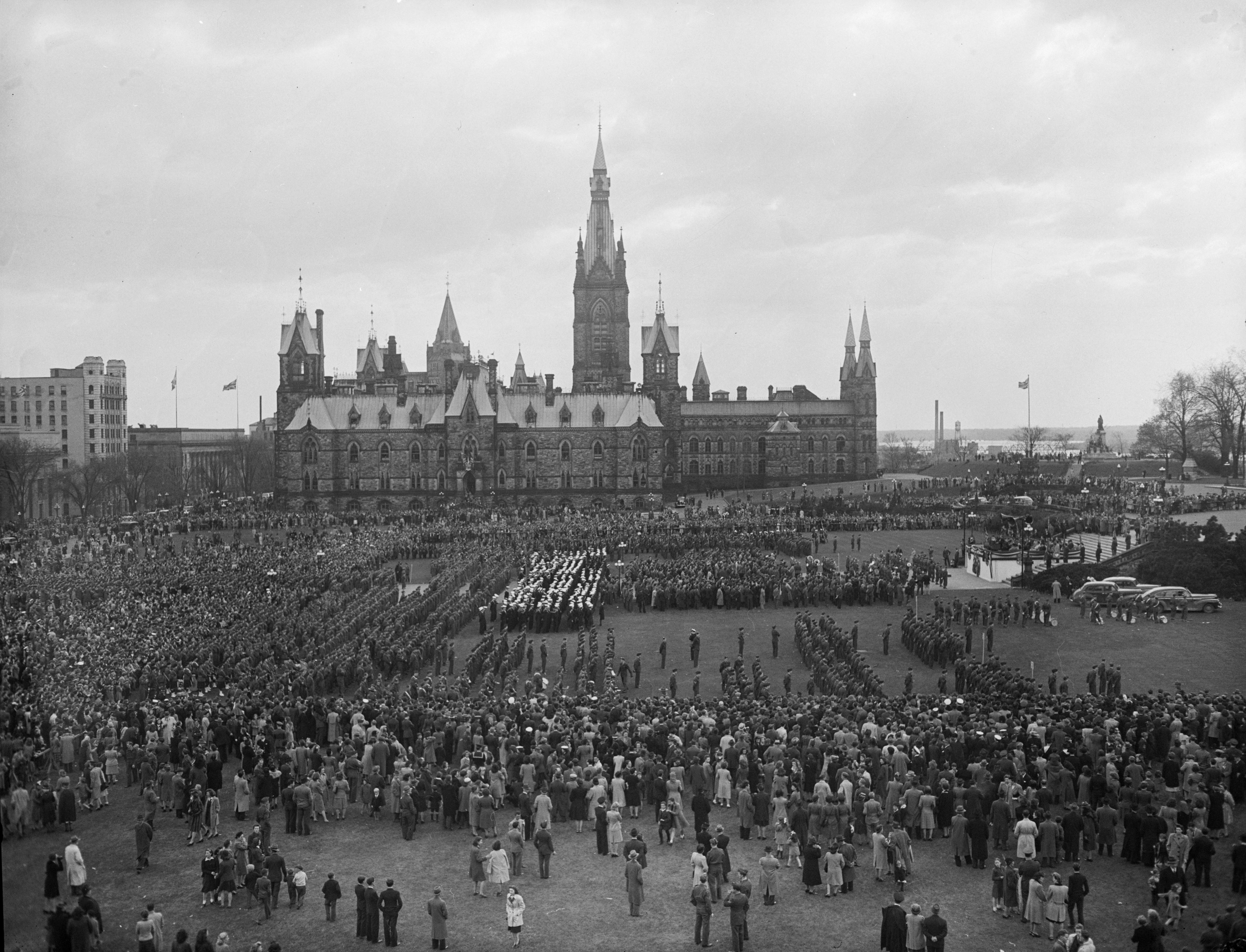 Military personnel and civilians celebrate the VE-Day parade to Parliament Hill in Ottawa, Ontario, May 8, 1945, in this handout photo provided by Library and Archives Canada. Seventy years ago, following the suicide of Nazi leader Adolf Hitler, Germany's head of state Karl Donitz signed his country's surrender to Allied forces in Reims, France on May 7, 1945 and in Berlin on May 8, 1945.