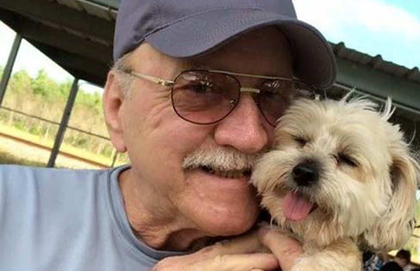 Handout photo of James Rogers and his dog 'Baby Girl' Leia.