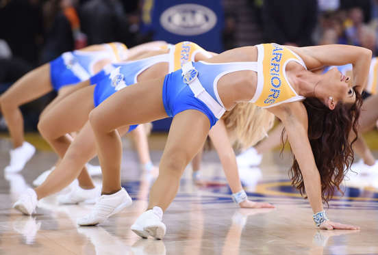 The Golden State Warriors cheerleaders the Warrior Girls performs against the Miami Heatat ORACLE Arena on January 14, 2015 in Oakland, California.