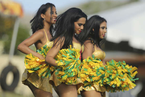 Cheerleaders perform during a match between Guyana Amazon Warriors and Antigua Hawksbills as part of week 5 of the Caribbean Premier League 2014 at Warner Park on August 07, 2014 in Basseterre, St. Kitts and Nevis