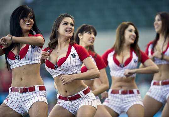 Cheerleaders dance in a game between Magallanes of Venezuela and Criollos de Caguas of Puerto Rico, during the 2013 Caribbean baseball series, on February 5, 2013, in Hermosillo, Sonora State, in the northern of Mexico.