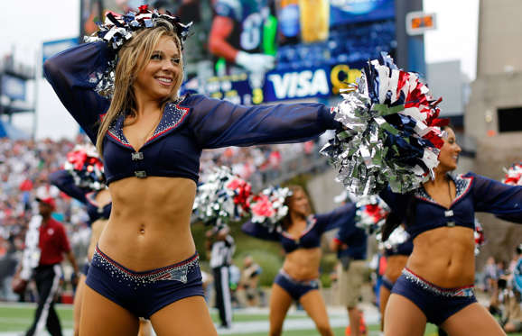 New England Patriots cheerleaders perform during the second half of the game between the New England Patriots and the Oakland Raiders at Gillette Stadium.