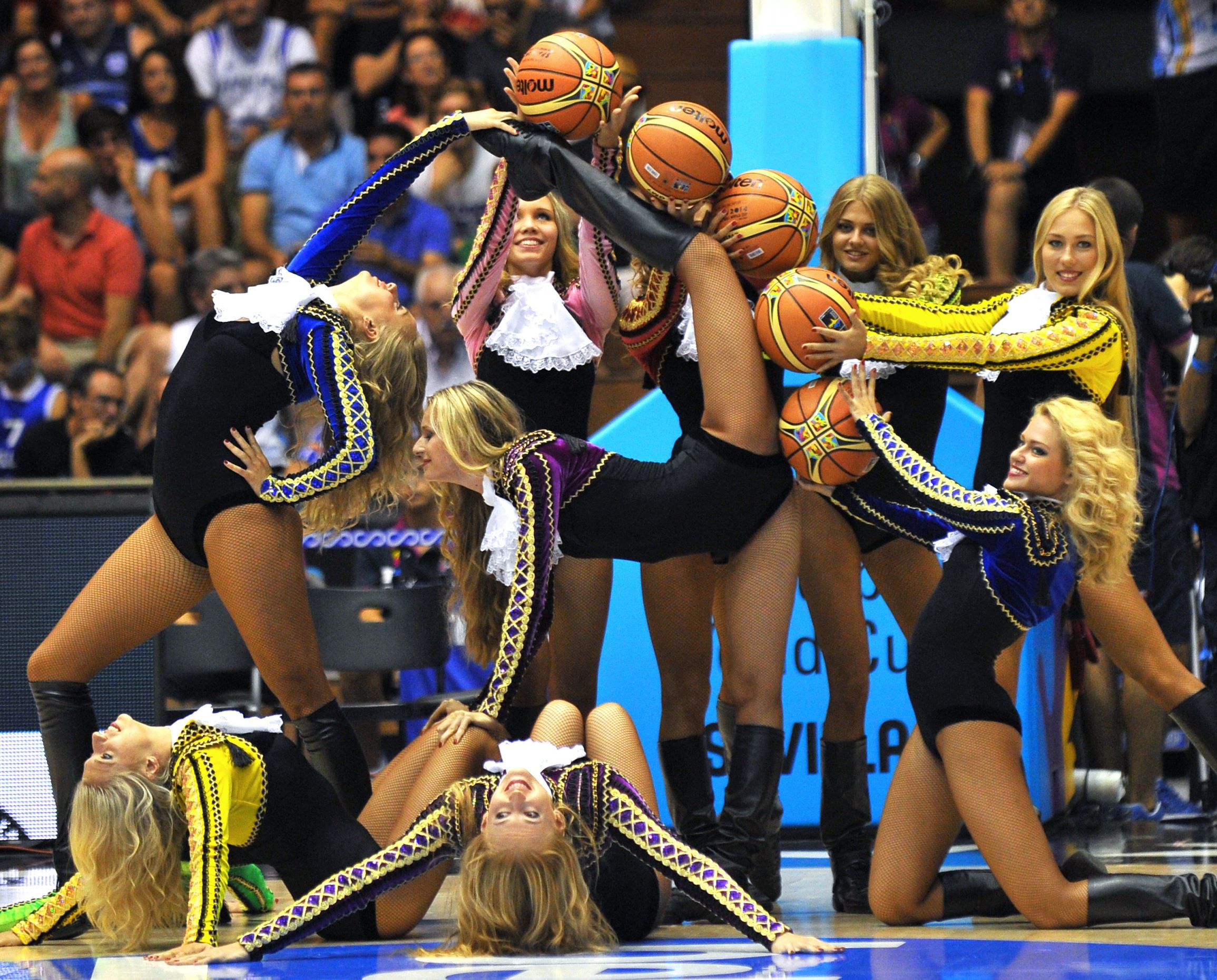 Cheerleaders perform during the 2014 FIBA World basketball championships group B match Croatia vs Puerto Rico at the Palacio Municipal de Deportes in Sevilla on September 4, 2014.