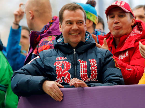 Dia 27 van 27: Feb 23, 2014; Krasnaya Polyana, RUSSIA; Russian prime minister Dmitry Medvedev reacts after heat four of men's four-man bobsleigh during the Sochi 2014 Olympic Winter Games at Sanki Sliding Center.
