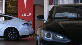 Tesla Model S cars are displayed at a Tesla showroom