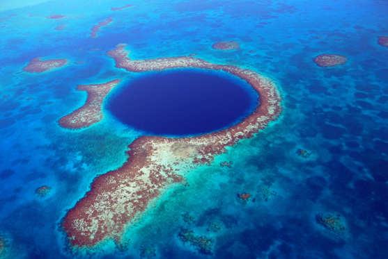 Great Blue Hole - Andrew Hounslea/Getty Images The Great Blue Hole is a large underwater sinkhole. It is one of the most preferred destination by the scuba divers and the people who attracted by the opportunity to see myriad species of marine life including tropical fish and spectacular coral formations.